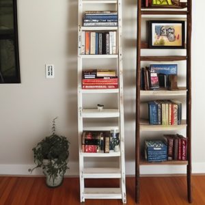 An old ladder repurposed as a shelving unit for books or decor